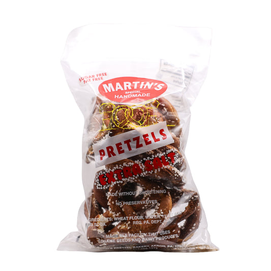 A bag of Martin's Handmade Pretzels with extra salt on a white background.
