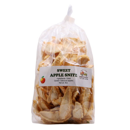 Bag of sweeet apple snitz on a white background.