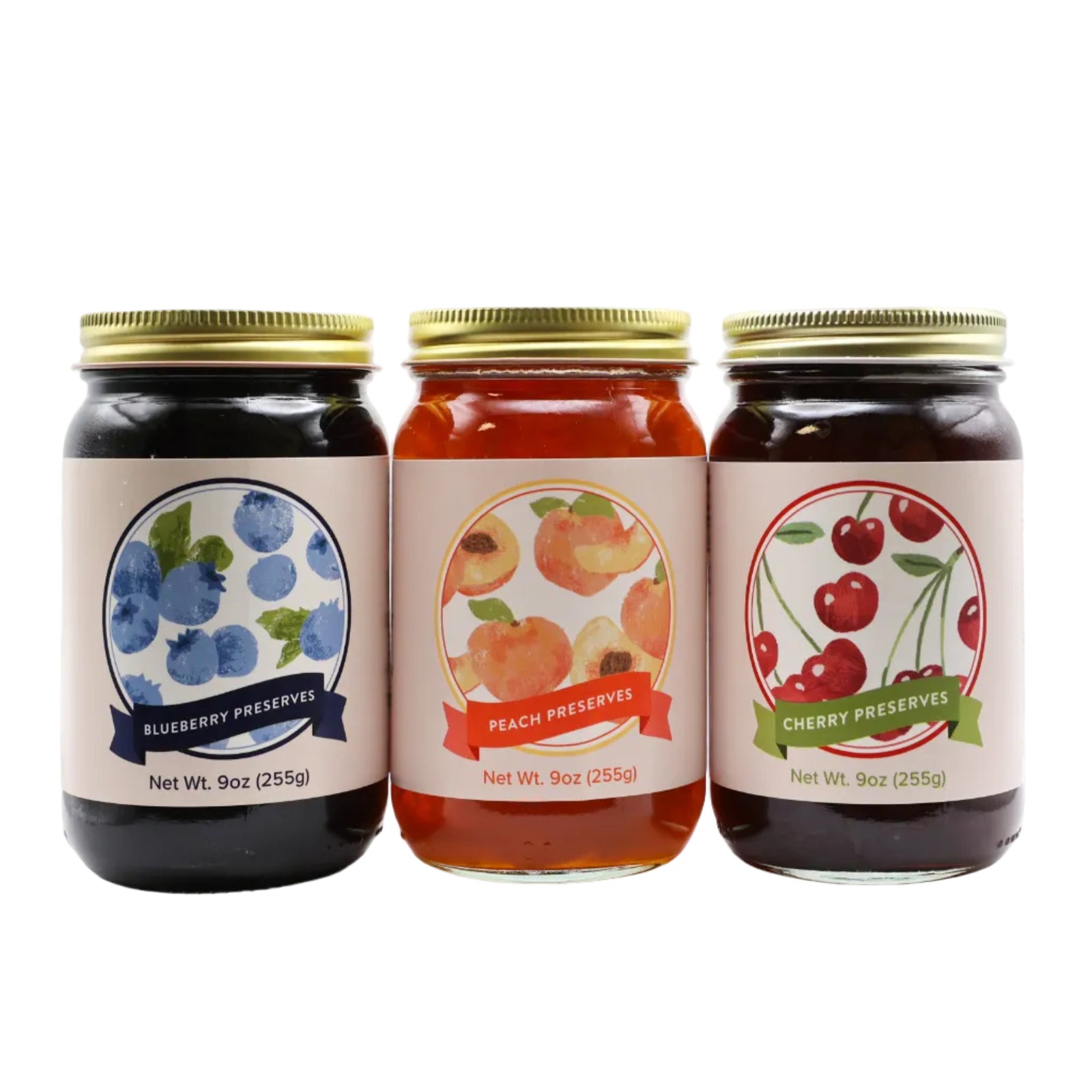 Three jars of preserves with labels for blueberry, peach, and cherry flavors on a white background.